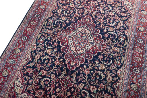 Backside of handmade New Hamedan rug showing knot structure and weave density
