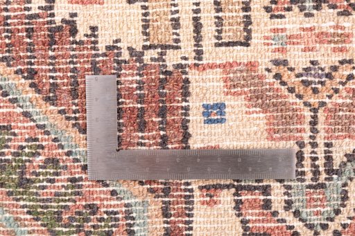 Corner detail of 1992s Hamedan rug showing border pattern and Wool pile