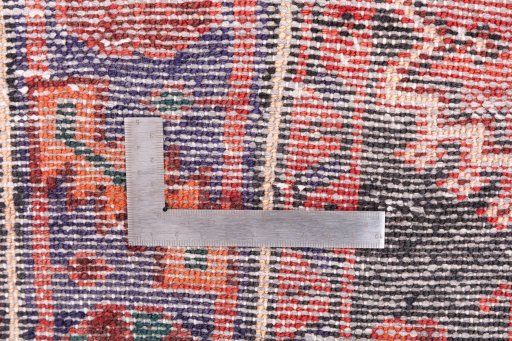 Corner detail of 1970s Hamedan rug showing border pattern and Wool pile
