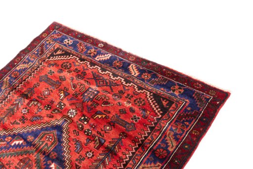 Surface texture of 1970s Hamedan rug with natural Wool and intricate pattern