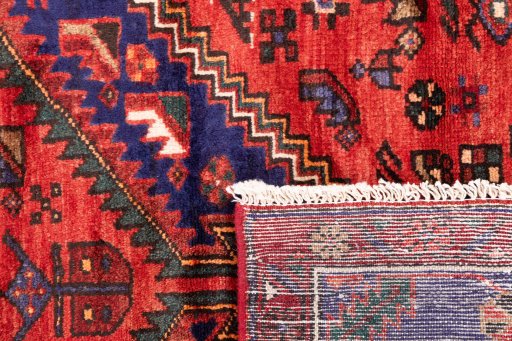 Close-up detail of 1970s Hamedan rug from Iran / Persia showing Wool weave