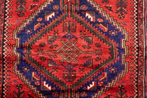 Full view of 1970s Hamedan rug from Iran / Persia, 204 × 130 cm in Red tones