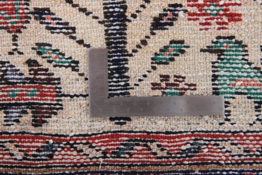 Close-up detail of 1990s Hamedan rug from Iran / Persia showing Wool weave