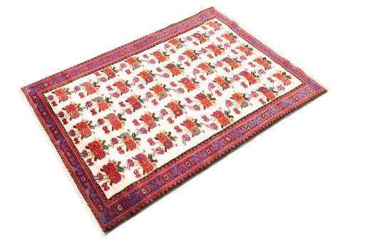 Corner detail of 1998s Hamedan rug showing border pattern and Wool pile