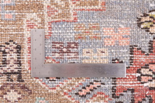 Corner detail of 1994s Hamedan rug showing border pattern and Wool pile