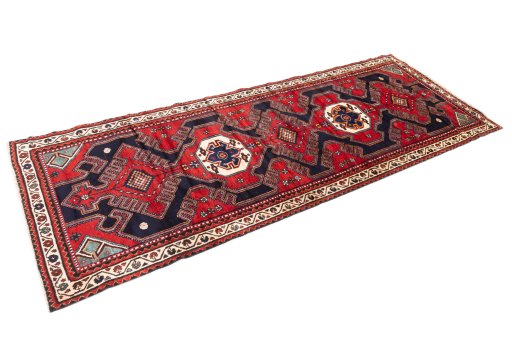 Close-up detail of 1996s Hamedan rug from Iran / Persia showing Wool weave