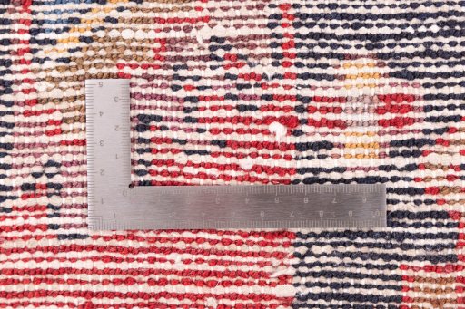 Corner detail of 1970s Hamedan rug showing border pattern and Wool pile