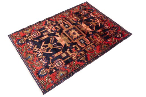 Close-up detail of 1970s Hamedan rug from Iran / Persia showing Wool weave