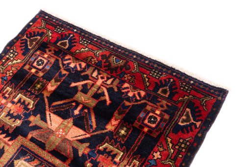 Surface texture of 1970s Hamedan rug with natural Wool and intricate pattern