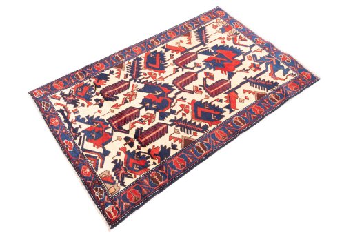 Corner detail of 1975s Hamedan rug showing border pattern and Wool pile