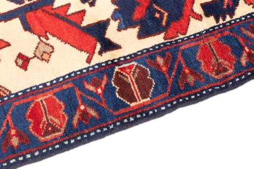 Backside of handmade 1975s Hamedan rug showing knot structure and weave density