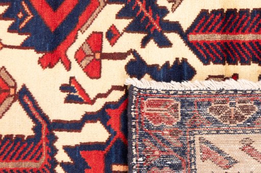 Close-up detail of 1975s Hamedan rug from Iran / Persia showing Wool weave