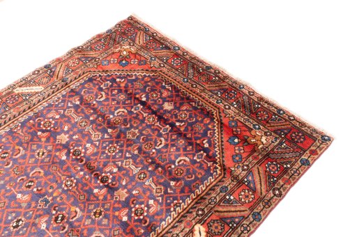 Surface texture of 1996s Hamedan rug with natural Wool and intricate pattern