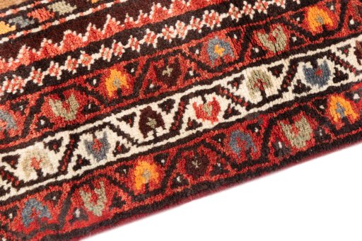 Backside of handmade 1996s Hamedan rug showing knot structure and weave density