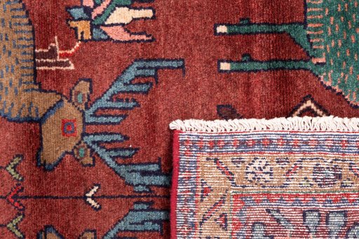 Close-up detail of 1996s Hamedan rug from Iran / Persia showing Wool weave