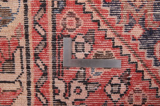 Corner detail of 1980s Hamedan rug showing border pattern and Wool pile
