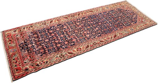Corner detail of 1980s Hamedan rug showing border pattern and Wool pile