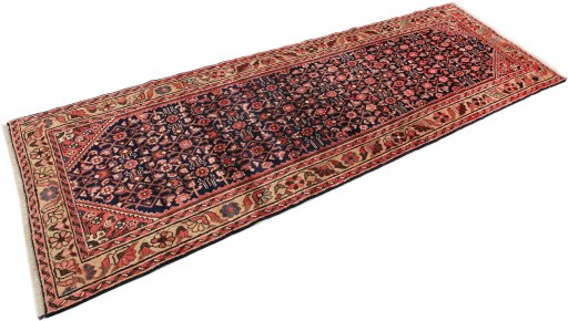 Close-up detail of 1980s Hamedan rug from Iran / Persia showing Wool weave