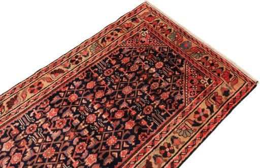 Surface texture of 1980s Hamedan rug with natural Wool and intricate pattern