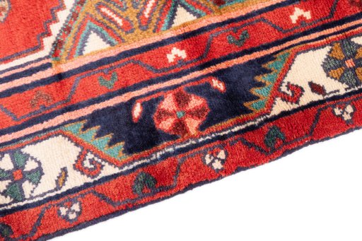 Backside of handmade 1985s Hamedan rug showing knot structure and weave density