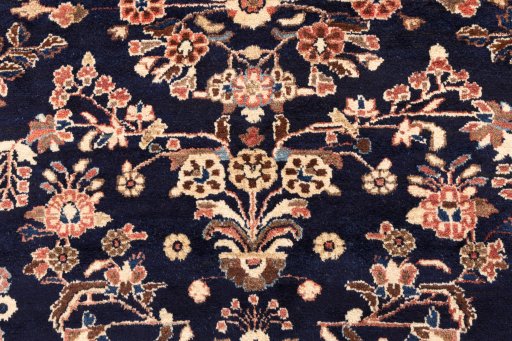 Corner detail of 2001s Hamedan rug showing border pattern and Wool pile