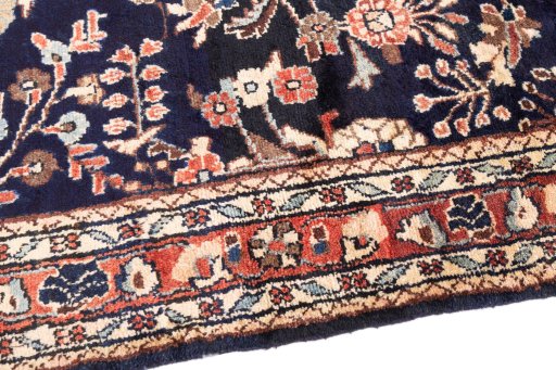 Backside of handmade 2001s Hamedan rug showing knot structure and weave density