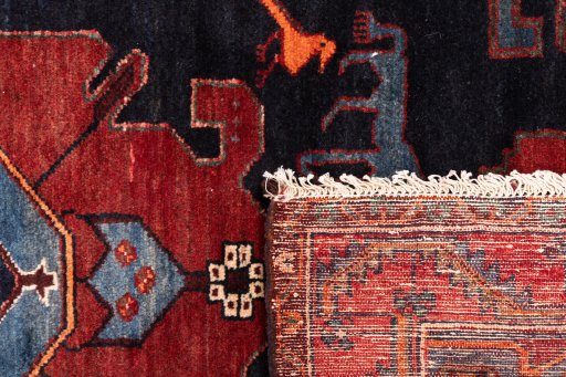 Close-up detail of 1999s Hamedan rug from Iran / Persia showing Wool weave
