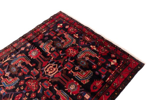 Surface texture of 1990s Hamedan rug with natural Wool and intricate pattern
