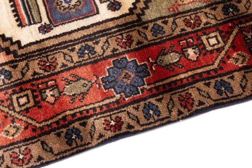 Backside of handmade 1995s Hamedan rug showing knot structure and weave density