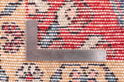 Corner detail of 1970s Hamedan rug showing border pattern and Wool pile