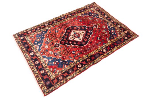 Close-up detail of 1970s Hamedan rug from Iran / Persia showing Wool weave