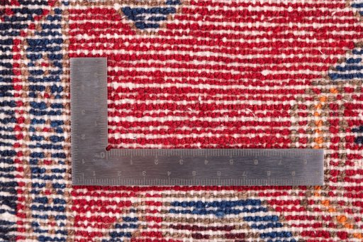 Corner detail of 1970s Hamedan rug showing border pattern and Wool pile