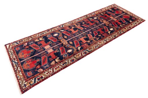 Close-up detail of 1970s Hamedan rug from Iran / Persia showing Wool weave