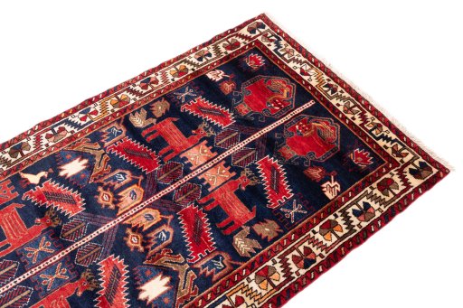Surface texture of 1970s Hamedan rug with natural Wool and intricate pattern