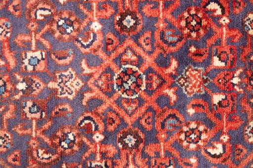 Full view of 1986s Hamedan rug from Iran / Persia, 435 × 105 cm in Red tones