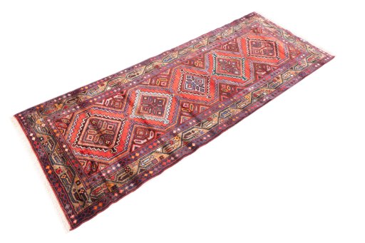 Corner detail of 1997s Hamedan rug showing border pattern and Wool pile