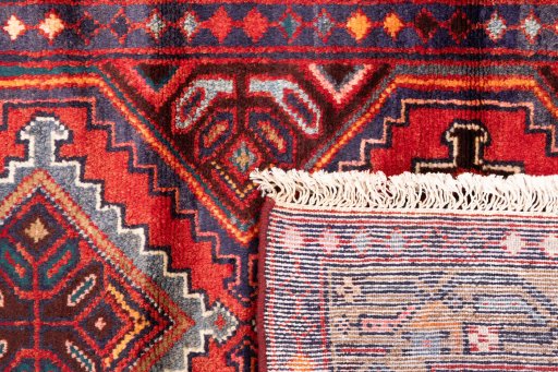 Close-up detail of 1997s Hamedan rug from Iran / Persia showing Wool weave