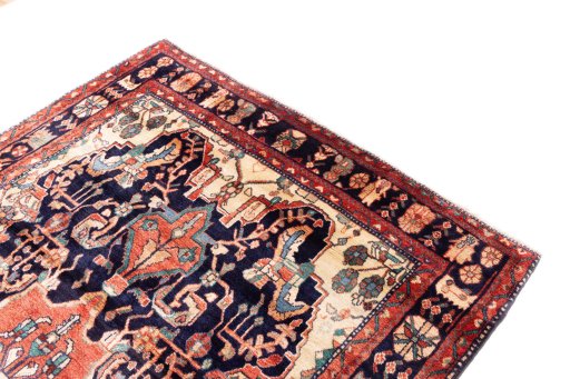 Surface texture of 1980s Hamedan rug with natural Wool and intricate pattern
