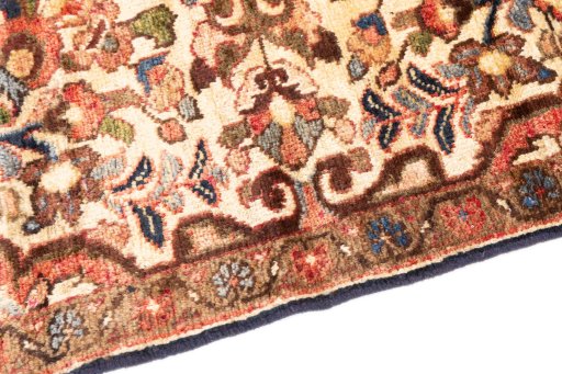 Backside of handmade 1975s Hamedan rug showing knot structure and weave density