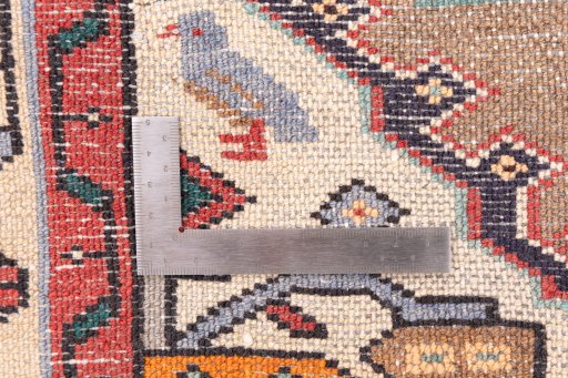 Corner detail of 1970s Hamedan rug showing border pattern and Wool pile
