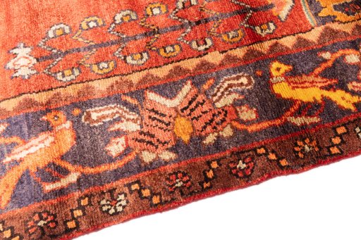 Backside of handmade 1995s Hamedan rug showing knot structure and weave density