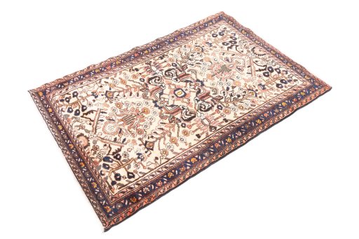 Corner detail of 1973s Hamedan rug showing border pattern and Wool pile