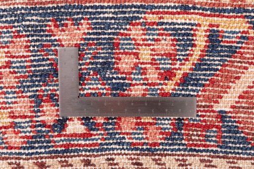 Backside of handmade 1997s Hamedan rug showing knot structure and weave density