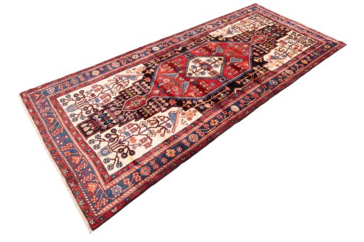 Close-up detail of 1997s Hamedan rug from Iran / Persia showing Wool weave