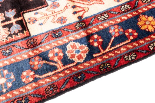 Backside of handmade 1997s Hamedan rug showing knot structure and weave density