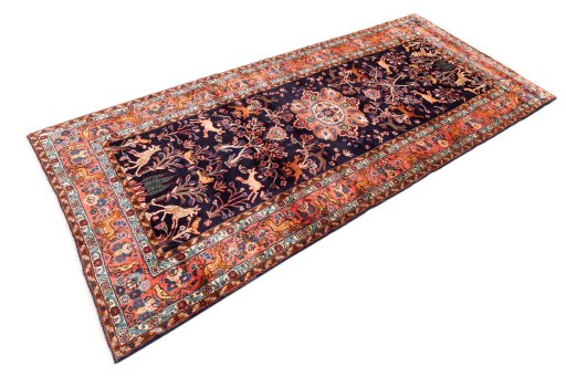 Corner detail of 1998s Hamedan rug showing border pattern and Wool pile