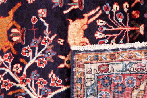 Close-up detail of 1998s Hamedan rug from Iran / Persia showing Wool weave