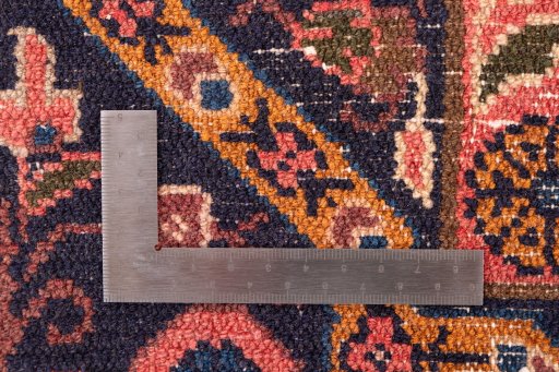 Close-up detail of 1975s Hamedan rug from Iran / Persia showing Wool weave