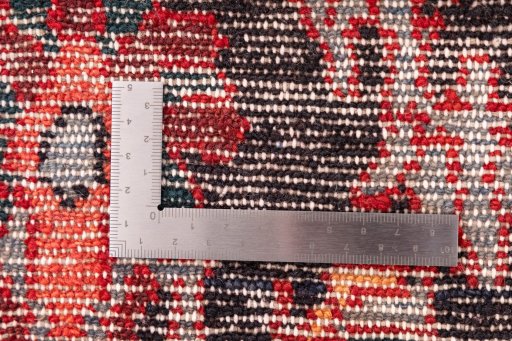 Close-up detail of 1998s Hamedan rug from Iran / Persia showing Wool weave