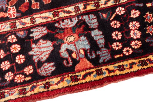 Backside of handmade 1998s Hamedan rug showing knot structure and weave density